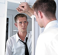 man-looking-in-the-mirror