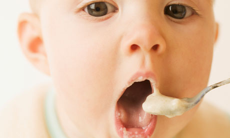 baby eating from spoon